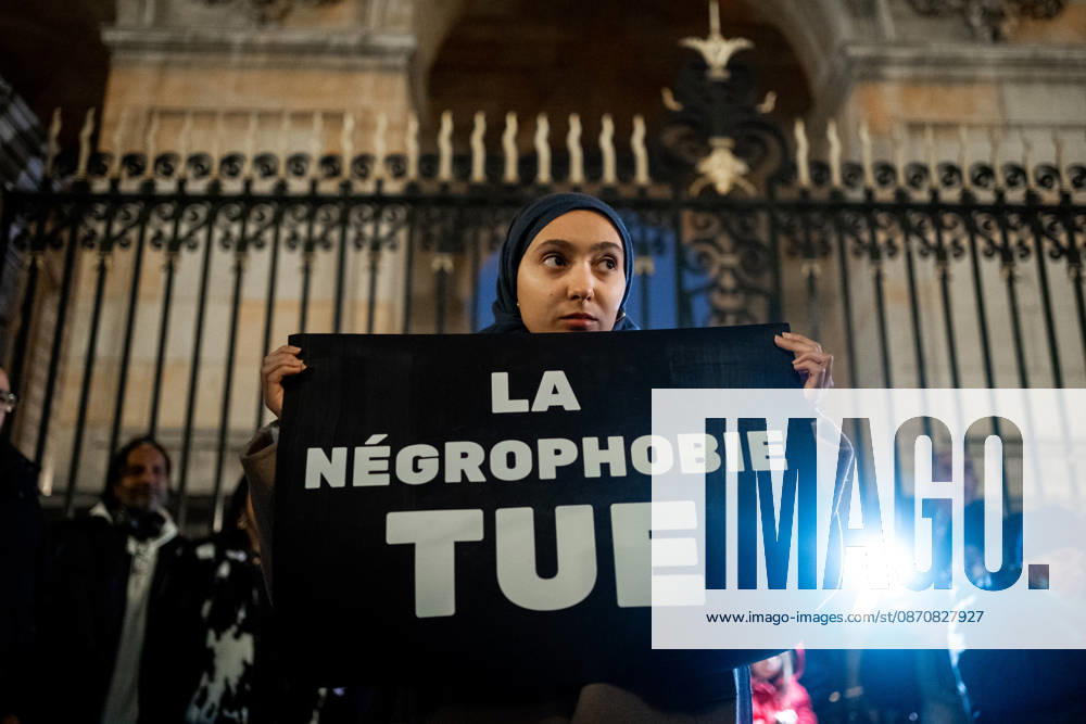 Rally in Lyon following the attacks in Trappes and La Verrière on October 26, 2026. Nicolas Liponne MAXPPP Lyon 10 26 2026. A person holding a sign that reads Negrophobia Kills, during the rally in memory of Pengo Bossio Wangi, who was killed in the racist terrorist attack in Trappes and La Verrière on October 23, 2026, in front of Lyon City Hall, October 26, 2026 A person holding a sign that reads Negrophobia Kills during a rally in memory of Pengo Bossio Wangi, who was killed in the racist terrorist attack in Trappes and La Verrière on October 23, 2026, in front of Lyon City Hall on October 26, 2026. Lyon, Auvergne-Rhône-Alpes, France