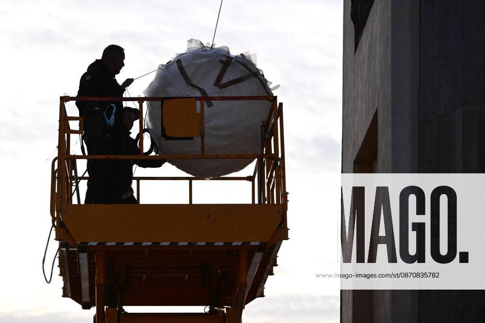 New Lighting for the Brandenburg Gate ** FOR ** **New Lighting for the Brandenburg Gate, Berlin’s most famous landmark is getting a nighttime makeover; the usual lighting will be turned off and the moonlight —a glowing sphere in the central archway—will be turned on, photographed on