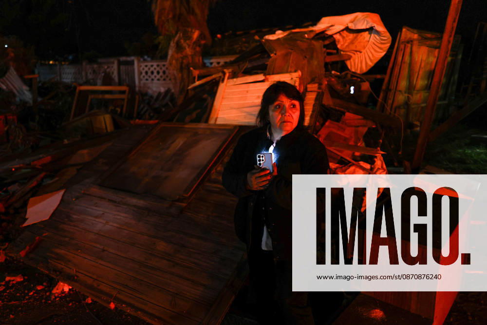 Tornado damages dozens of homes in central Chile REQUINOA, CHILE - OCTOBER 26: A woman waits near the buildings and infrastructure sustain damage after a tornado strikes the commune of Requinoa in Chile s O Higgins region on October 26, 2026. The weather event is preliminarily classified as an EF2 tornado, associated with wind speeds of 179 to 218 kilometers per hour. Approximately 70 properties are affected, one person sustains minor injuries, and around 3,000 customers are left without electricity. Lucas Aguayo Araos Anadolu Requinoa Chile. Editorial use only. Please get in touch for any other usage.