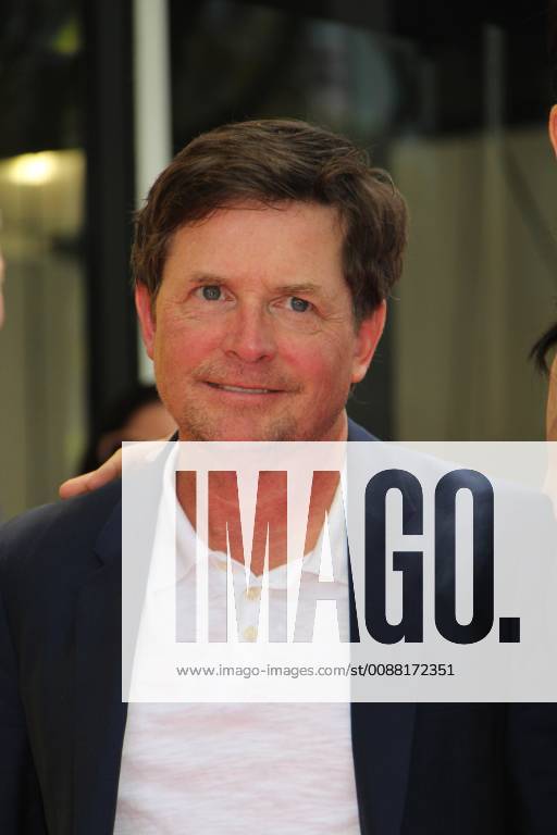 Michael J. Fox 05 01 2015 Julianna Margulies honored with a star on the Hollywood Walk of Fame at Hollywood, CA