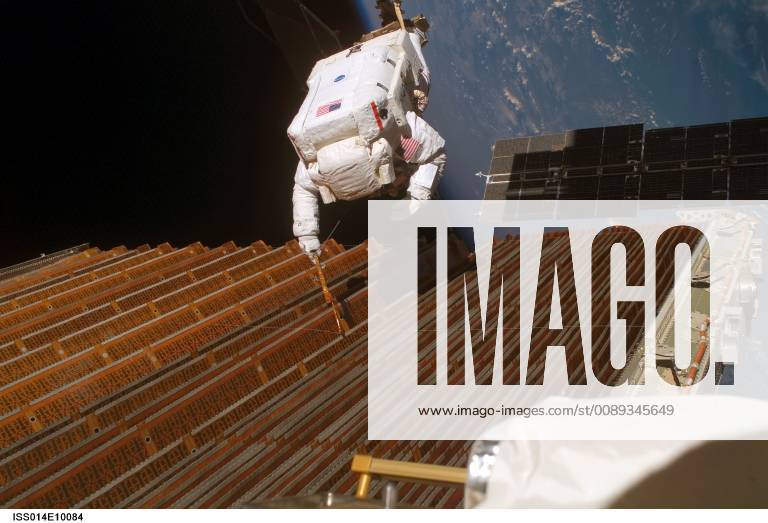 Space - File - Robert Curbeam currently holds the record for the most spacewalks during a single spaceflight. In this image from December 2006, Curbeam works on the port overhead solar array wing on the International Space Station s P6 truss during Space Shuttle Discovery s STS-116 mission. This was the mission s fourth spacewalk. Curbeam conducted this spacewalk with European Space Agency astronaut Christer Fuglesang (out of frame), using specially prepared, tape-insulated tools, to guide the array wing neatly inside its blanket box during the 6-hour, 38-minute spacewalk. Space - ZUMAz03_ 20190212_sha_z03_755