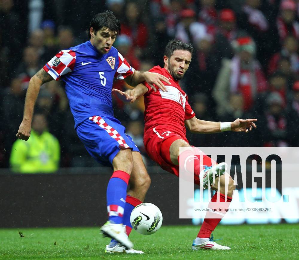UEFA Euro 2012 play off first leg match between Turkey and Croatia ( blue)at Turk Telekom Arena Stadium in Istanbul, Turkey 11.11.2011 Match scored: Turkey 0 - Croatia 3 Pictured: Vedran Corluka of Croatia and Gökhan Gönul of Turkey.