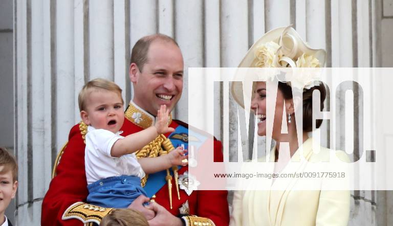 Prince William (Duke of Cambridge), Kate Middleton (Duchess of Cambridge) holding Prince Louis, Prince George, Princess Charlotte, alongside Camilla (Duchess of Cornwall) Prince Charles (Prince of Wales), Queen Elizabeth II, pictured at the Trooping of the Colour 2019. Trooping the Colour marks the Queens official birthday and 1,400 soldiers, 200 horse and 400 musicians parade for Queen Elizabeth II, and the event finishes with an RAF flypast as the Royal Family watch from the balcony at Buckingham Palace. This year the colour will be trooped by 1st Battalion Grenadier Guards Trooping the Colour, London