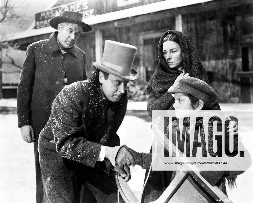 George Coulouris, Agnes Moorehead, Harry Shannon & Buddy Swan Characters: Walter Parks Thatcher, Mary Kane, Kane s Father, Kane, age eight Film: Citizen Kane (USA 1941) Director: Orson Welles 01 May 1941
