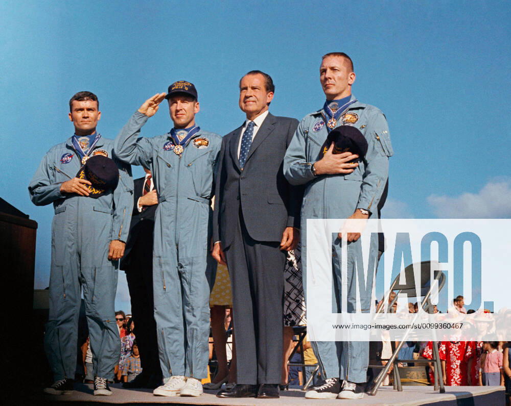 President Richard M. Nixon and the Apollo 13 crew salute the U.S. flag during the post-mission ceremonies at Hickam Air Force Base, Hawaii. Earlier, astronauts John Swigert, Jim Lovell, and Fred W. Haise were presented the Presidential Medal of Freedom by the Chief Executive. Apollo 13, launched on April 11, 1970, was NASA s third crewed mission to the moon. Two days later, on April 13, while en route to the lunar surface, a fault in the electrical system of one of the Service Module s oxygen tanks produced an explosion that caused both oxygen tanks to fail and also led to a loss of electrical power. With the mission aborted, a dedicated team in the Apollo Mission Control Center devoted their efforts to developing a plan to shelter the crew in the lunar module as a lifeboat and retain sufficient resources to bring the spacecraft and its WAX2020041303 NASA