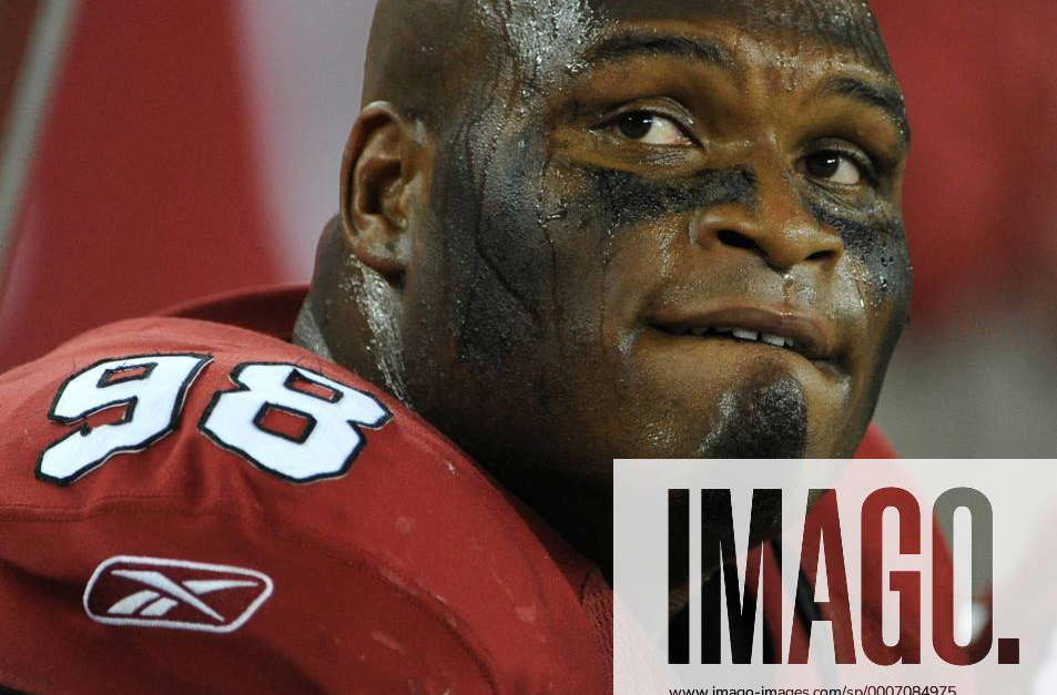 Arizona Cardinals tackle Gabe Watson looks up at the scoreboard in the last  minutes of the Cardinals-Dallas Cowboys game at University of Phoenix  Stadium in Glendale, AZ December 25,2010. The Cardinals defeated