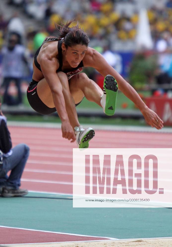 Baya Rahouli Flies Through The Air While Competing In The Women S baya-rahouli-flies-through-the-air-while-competing-in-the-women-s
