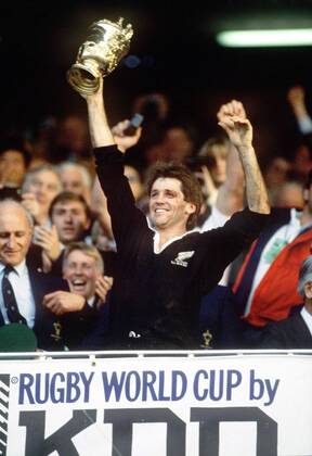 David Kirk lifts the World Cup Trophy for New Zealand. New Zealand