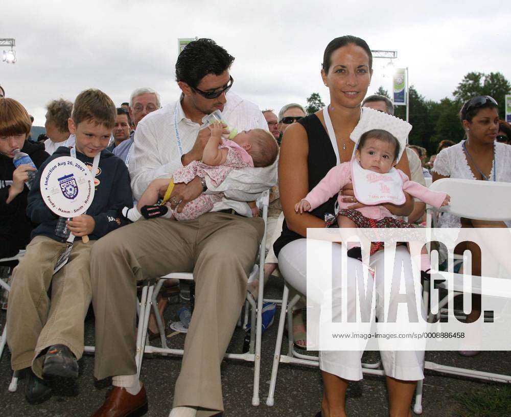 26 August 2007: Nomar Garciaparra, husband of 2007 inductee Mia Hamm (not  pictured), feeds their