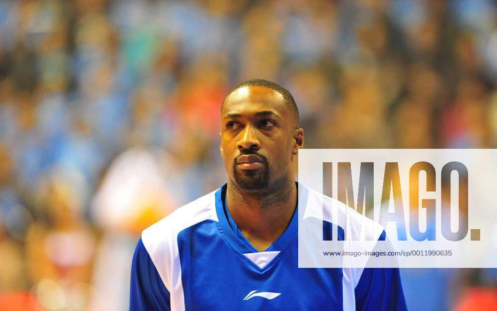 Gilbert Arenas of the Shanghai Sharks looks on before the first round ...