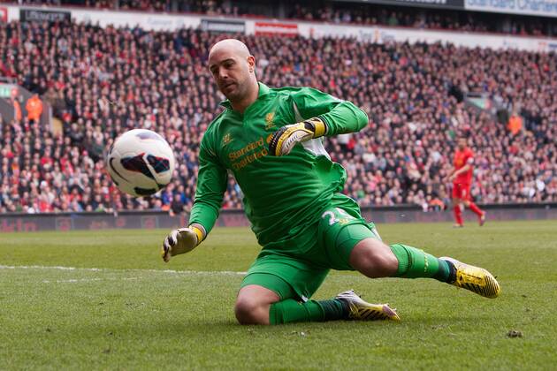 Football - 2012 2013 Premier League. Liverpool FC - West Ham United, Pepe Reina of Liverpool fails to keep a back pass in at Anfield 