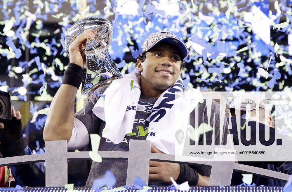 Seattle Seahawks quarterback Russell Wilson holds the Vince