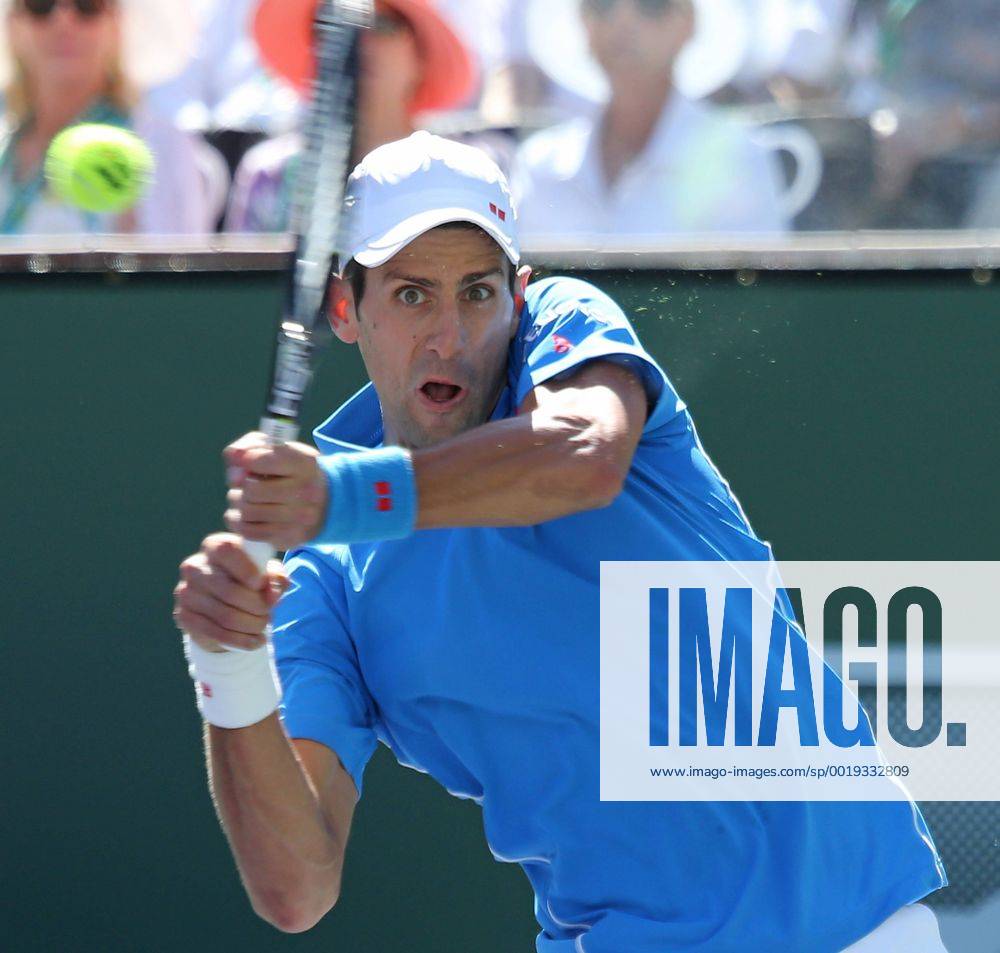 Novak Djokovic Of Serbia Hits A Shot During His Men S Semifinal Match ...