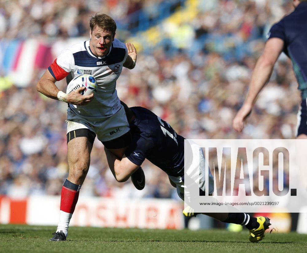 Blaine Scully of USA tackled by Mark Bennett of Scotland - Rugby World ...