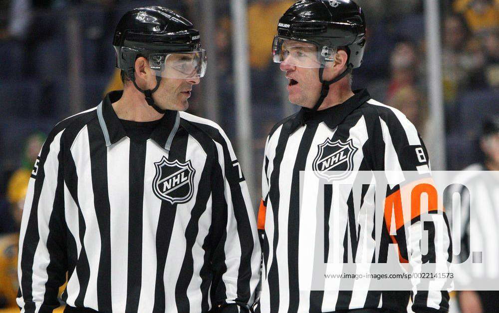 December 12 2015 Referee Dave Jackson 8 And Linesman Derek Amell 75 Talk During The Nhl 7581