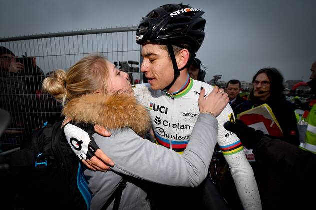 Belgian world champion Wout Van Aert and his girlfriend Sarah De Bie  celebrate after the elites