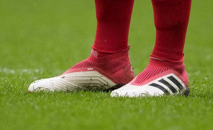 The Adidas Predator football boots of Mesut Ozil of Arsenal during the Premier League match between