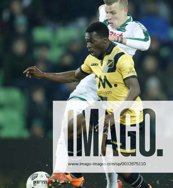 (L-R) Thomas Agyepong of NAC Breda, Samir Memisevic of FC Groningen ...