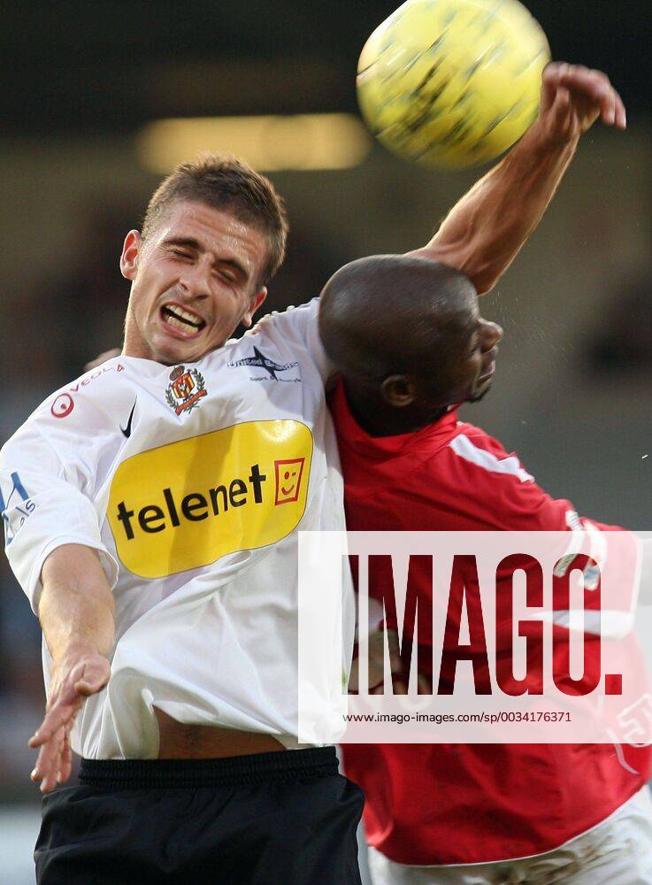 - MONS, BELGIUM: Mons s Mohammed Aliyu Datti (R) and Malines s Kenneth ...