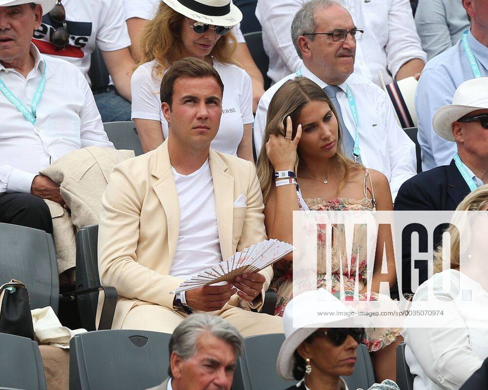 Mario Goetze and wife Ann Kathrin Brömmel at the Honor Tribune of