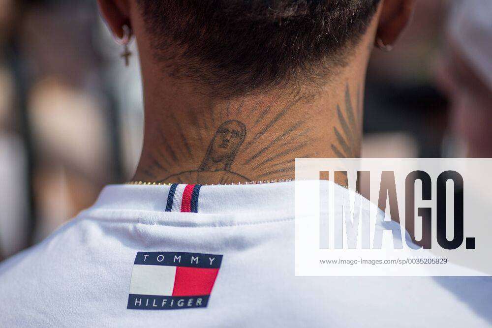 Lewis Hamilton in interview with TVs and radios, detail of the tattoo on  his neck Stock Photo - Alamy