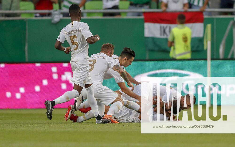 BUDAPEST, HUNGARY - JULY 12: (r-l) Roland Varga of Ferencvarosi TC hugs  goal scorer Stefan