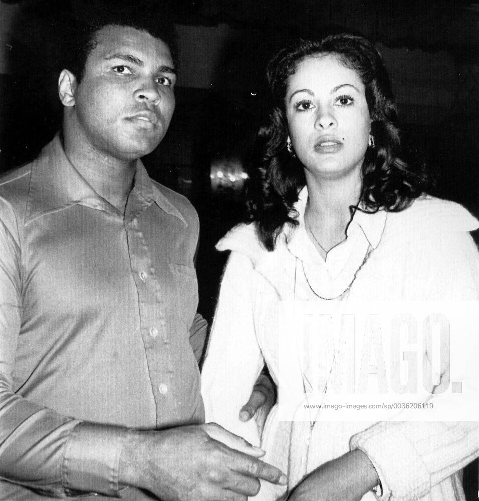 HEAVYWEIGHT CHAMPION MUHAMMAD ALI CHATS WITH HIS BRIDE-TO-BE VERONICA  PORCHE 4 6. AT press