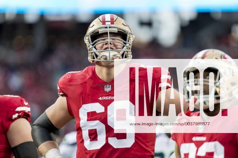 SAN FRANCISCO, CA - DECEMBER 16: San Francisco 49ers Offensive Tackle Mike  McGlinchey (69) looks at