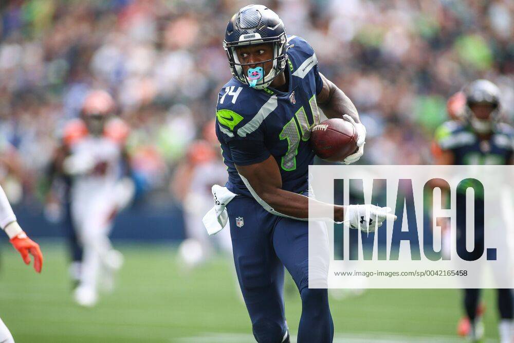 Seattle Seahawks wide receiver DK Metcalf (14) runs with the ball