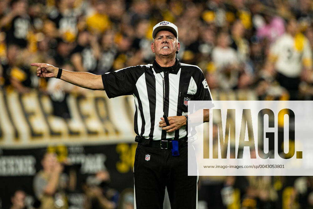 PITTSBURGH, PA - SEPTEMBER 30: referee Bill Vinovich (52) makes a call  during the NFL, American