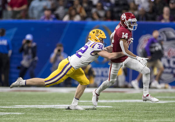 : Oklahoma wide receiver Charleston Rambo runs with the ball as LSU ...