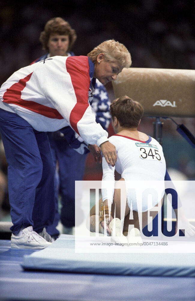Olympics Gymnastics 1996 Kerri Strug (USA) lands her vault on a injured