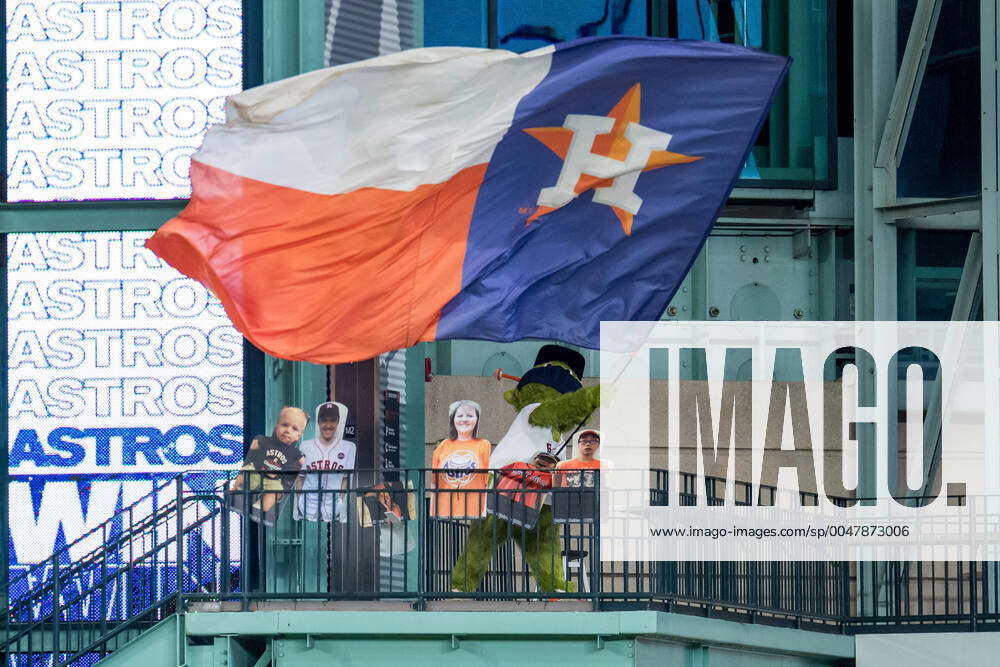 Houston Astros' mascot Orbit waves to fans during a game against the  Colorado Rockies on Tuesday, May 28, 2013, in Houston, Texas. Orbit  returned as the team's mascot after a long hiatus. (