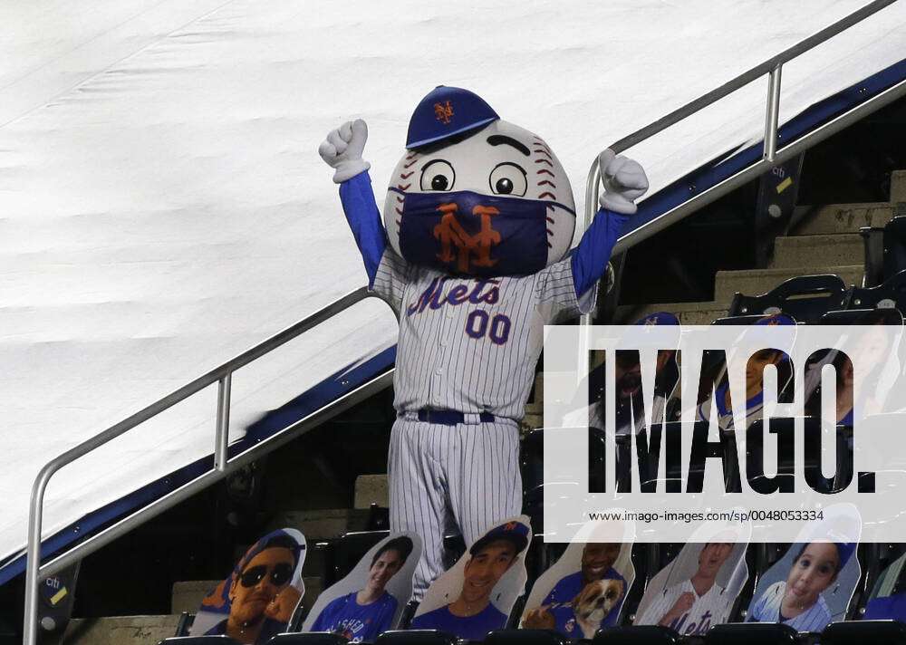 New York Mets team mascot Mr. Met wears a face mask while standing