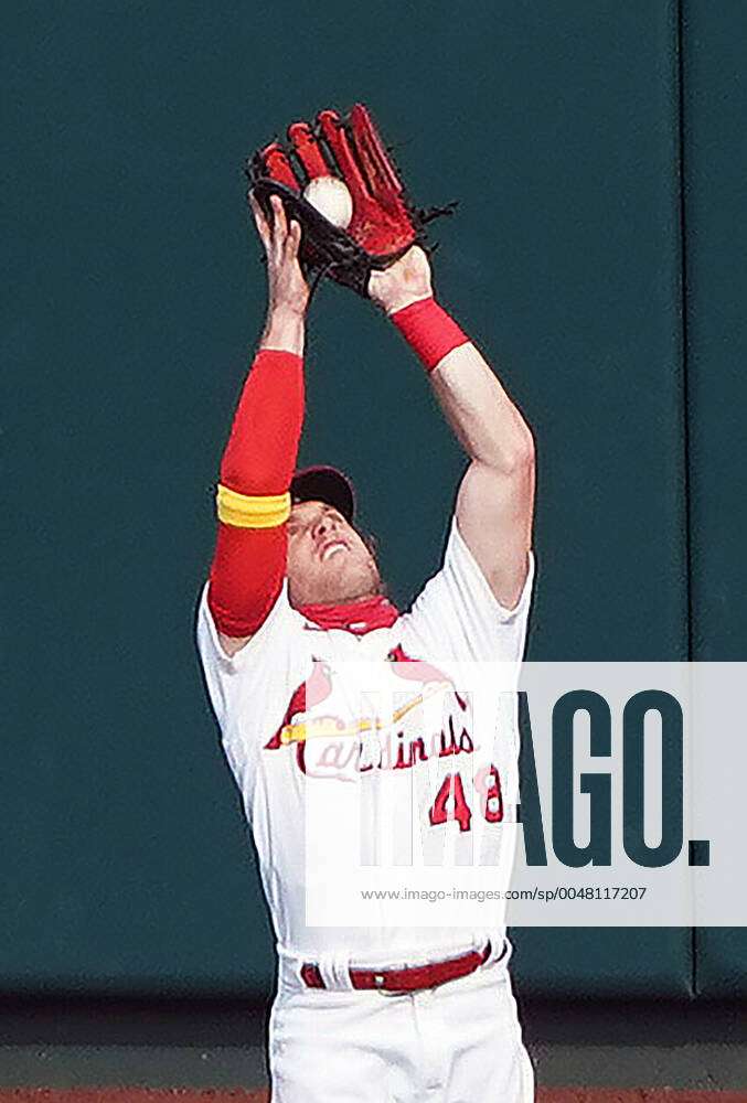 Harrison Bader of the St. Louis Cardinals catches a fly ball