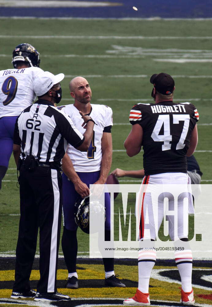 BALTIMORE, MD - SEPTEMBER 13: Baltimore Ravens punter Sam Koch (4) and  Cleveland Browns long snapper