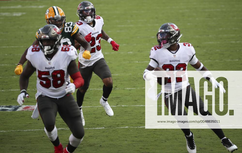 Tampa Bay Buccaneers safety Mike Edwards (32) runs to the ball as