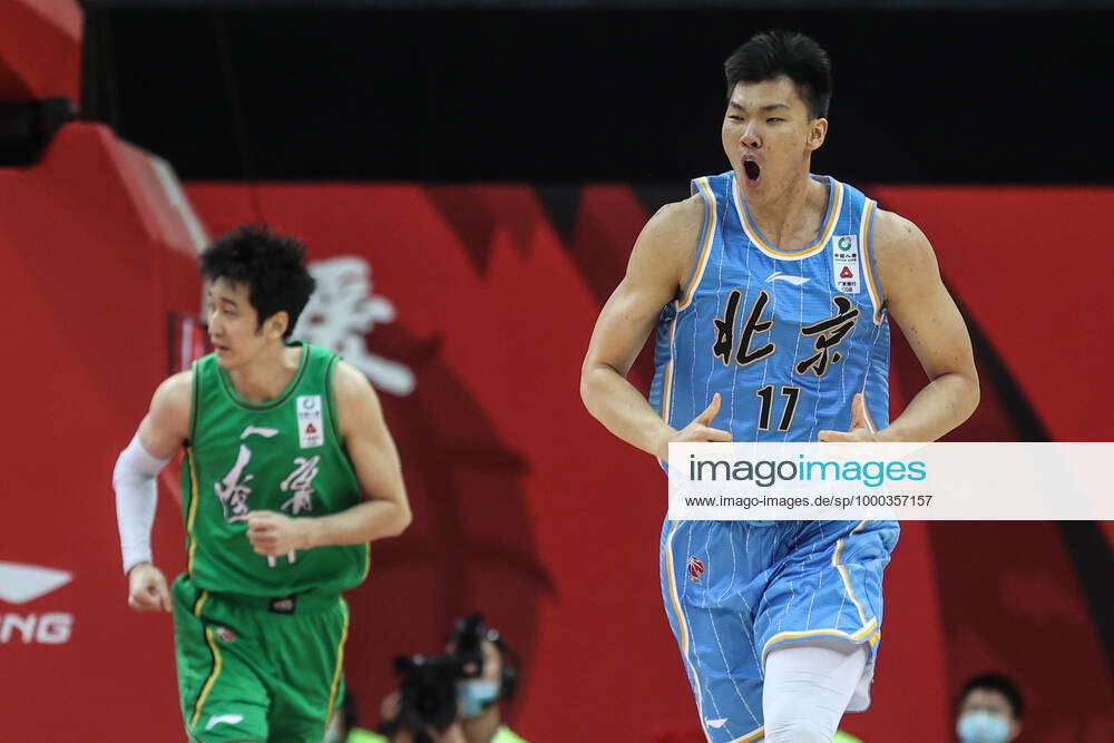 (210118) ZHUJI, Jan. 18, 2021 Fan Ziming (R) of Beijing Ducks