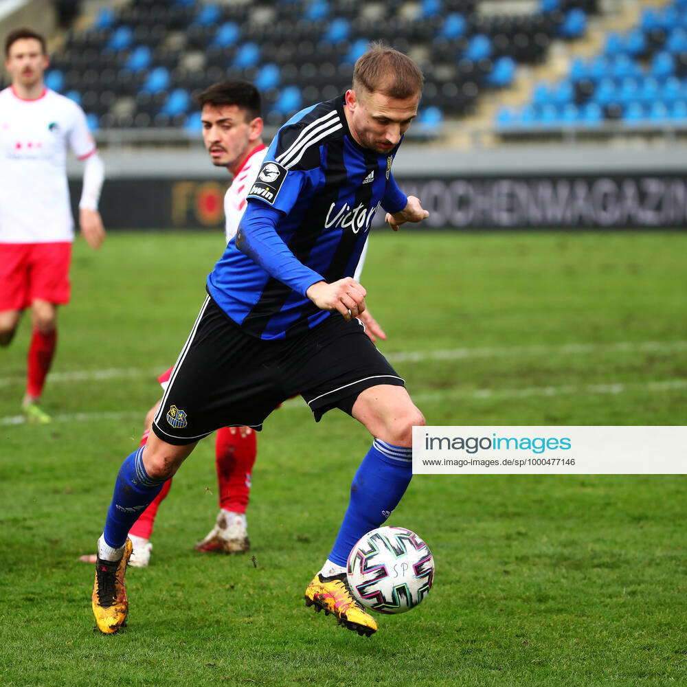 Timm Golley Saarbruecken takes a shot on goal 1 FC Saarbruecken vs VfB ...