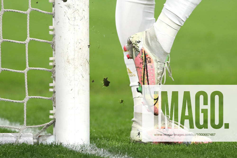 Cristiano Ronaldo of Juventus bangs his personalised boots against the base of the goalpost to