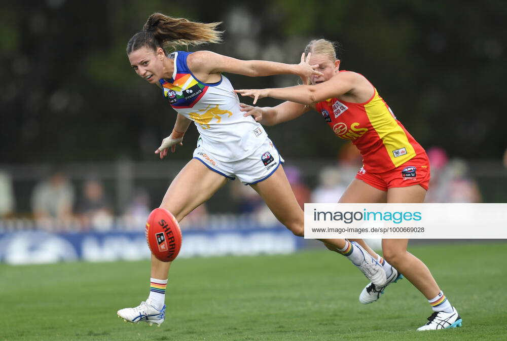 AFLW LIONS SUNS, Tahlia Hickie (left) of the Lions contests for the ...