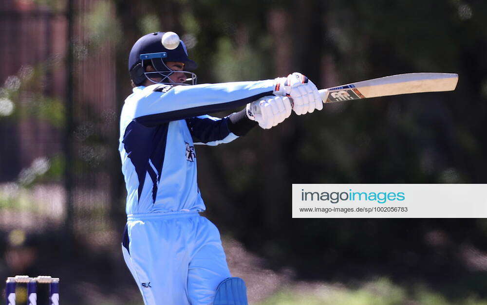 CRICKET MARSH CUP FINAL, Oliver Davies of NSW is hit in the helmet by a