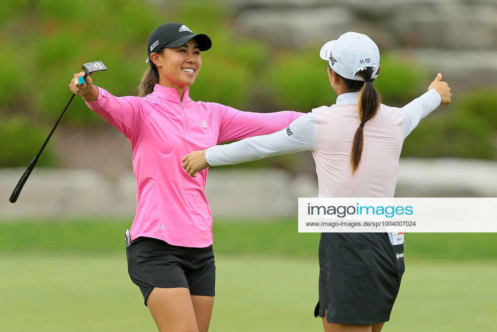 Dow Great Lakes Bay Invitational Teammaes Danielle Kang (L) celebrate