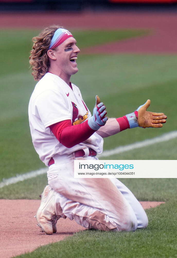 St. Louis Cardinals Harrison Bader makes a throw to first base in