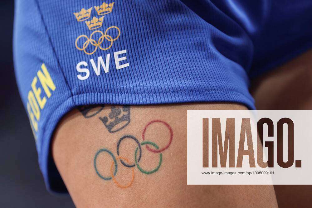 Olympic tattoo: Michael Phelps, Ryan Lochte and swimmer Elizabeth Beisel  each sport the logo | Daily Mail Online