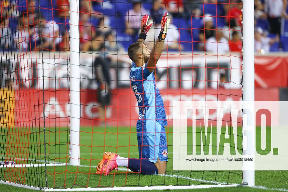 HARRISON, NJ - APRIL 09: New York Red Bulls goalkeeper Carlos Miguel  Coronel (1) makes a save with CF MontrÃ©al forward Sunusi Ibrahim (14)  behind him during the first half of the