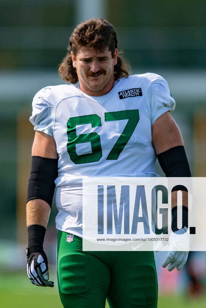 New York Jets offensive guard Dan Feeney (67) on the sidelines against the New  York Giants