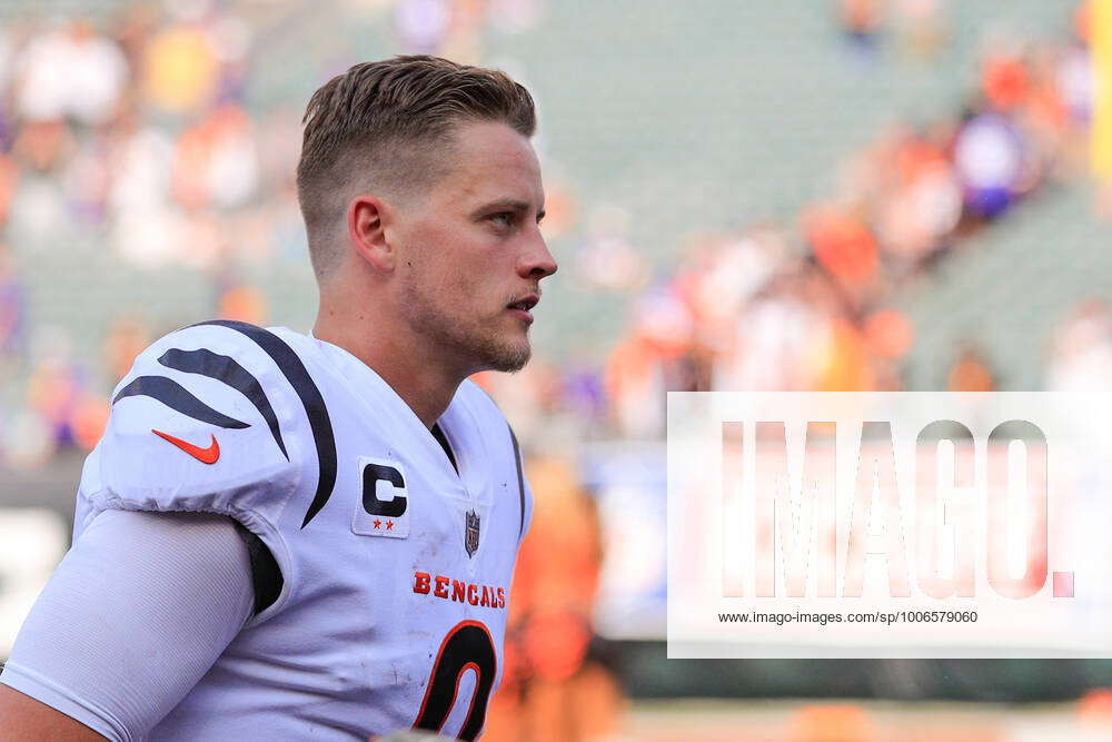 Cincinnati Bengals quarterback Joe Burrow (9) runs onto the field