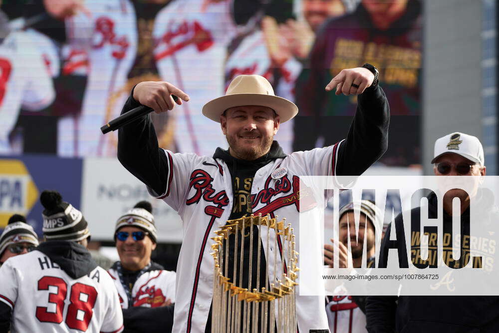 Pitcher Tyler Matzek addresses fans at a ceremony after a parade to