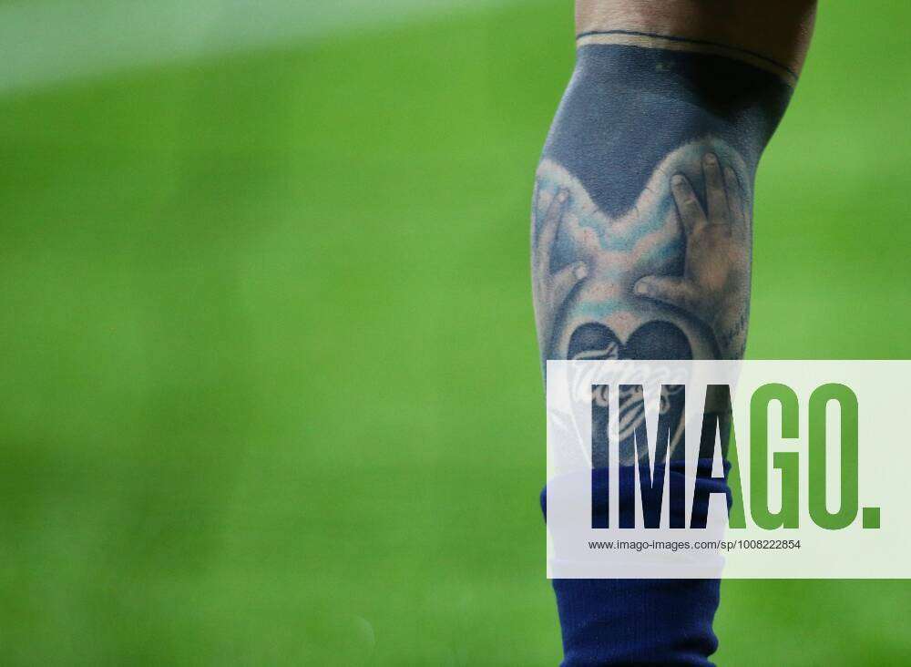 Mandatory Credit: Photo by Matt West Shutterstock (12615942f) A tattoo on  the leg of Lionel Messi